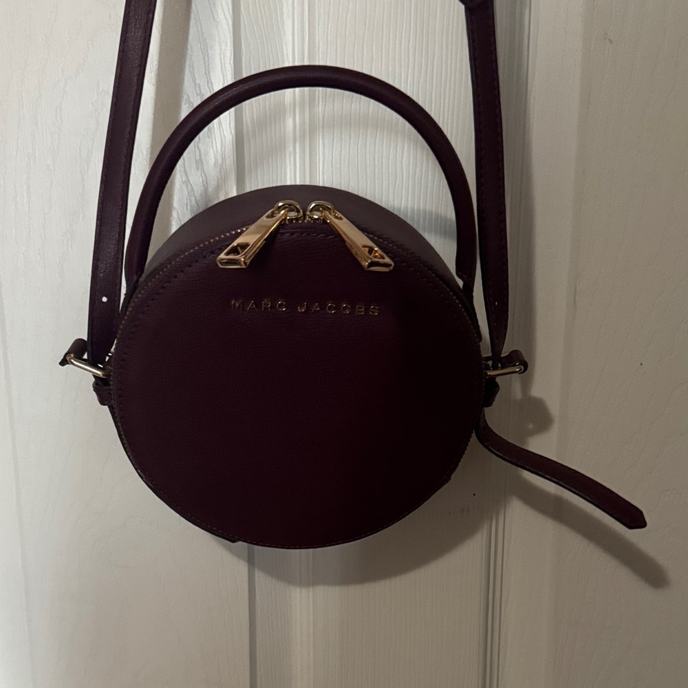 Marc Jacobs Circular Crossbody in Burgundy with Gold Hardware